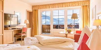 Familienhotel - Einzelzimmer mit Kinderbett - Walchsee - Doppelzimmer "Brixental" - Landhotel Schermer