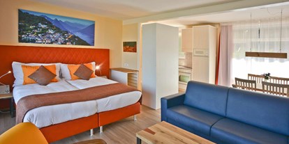Familienhotel - Suiten mit extra Kinderzimmer - Schweiz - Family Suite Deluxe - Top Familienhotel La Campagnola