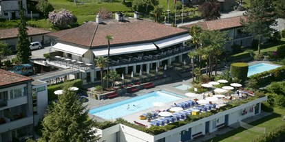 Familienhotel - Pools: Außenpool beheizt - Tessin - Aussenansicht - Top Familienhotel La Campagnola