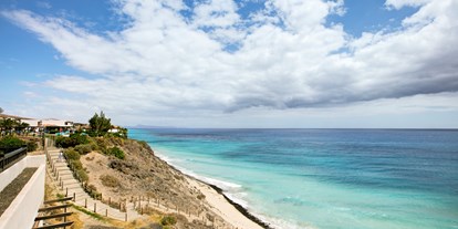 Familienhotel - Verpflegung: alkoholfreie Getränke ganztags inklusive - Kanarische Inseln - Treppe zum Strand - TUI MAGIC LIFE Fuerteventura