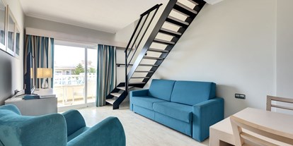 Familienhotel - Klassifizierung: 4 Sterne - Balearische Inseln - Sitzbereich im Appartement - FAMILY HOTEL Playa Garden
