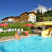 Familienhotel: Außenpool mit Wasserrutsche: https://www.glocknerhof.at/hotel-mit-pool-und-wasserrutsche-in-kaernten.html - Hotel Glocknerhof