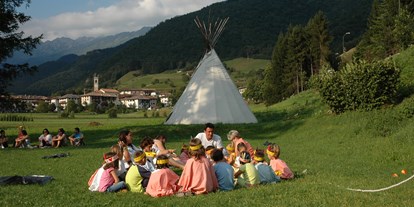 Familienhotel - Kinderwagenverleih - Trentino - Kinderspielplatz - Family Hotel Adriana