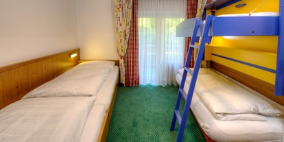 Familienhotel - Sauna - Zell am See - Kinderzimmer Familienappartement - The RESI Apartments "mit Mehrwert"