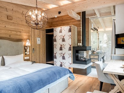Familienhotel - Babyphone - Tirol - Doppelzimmer mit Kamin - Aktiv-& Wellnesshotel Bergfried