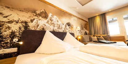Familienhotel - Garten - Pinzgau - Zimmer mit Doppelbett - Übergossene Alm Resort