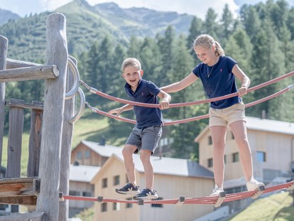 Familienhotel - Kletterwand - Davos Platz - Bei uns wird den ganzen Tag gespielt. Wir bieten täglich Kinderbetreuung von 9.00 Uhr morgens bis 20.30 Uhr abends - Gorfion Familotel Liechtenstein