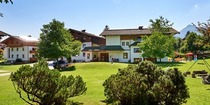 Familienhotel - Ausritte mit Pferden - Salzburg - Ferienanlage im Sommer - Sonnberg Ferienanlage