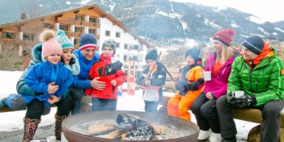 Familienhotel - Verpflegung: alkoholfreie Getränke ganztags inklusive - Faak am See - Feuerstelle NockPlatz`l - Hotel NockResort