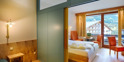 Familienhotel - Skikurs direkt beim Hotel - Keutschach - Beispiel Zimmer - Hotel NockResort