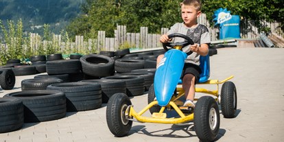 Familienhotel - Hallenbad - Tiroler Oberland - Die Go Carts sind der Hit! - Kinderhotel Laderhof