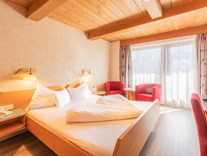 Familienhotel - Ausritte mit Pferden - Garmisch-Partenkirchen - Das Kaltschmid - Zimmer - Das Kaltschmid - Familotel Tirol