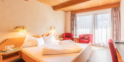 Familienhotel - Ausritte mit Pferden - Tirol - Das Kaltschmid - Zimmer - Das Kaltschmid - Familotel Tirol