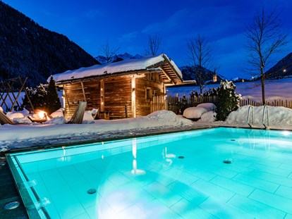 Familienhotel - Wasserrutsche - Südtirol - Außenpool Winter - Hotel Masl