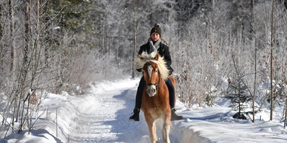 Familienhotel - Ausritte mit Pferden - Salzburg - Winterreiten - POST Family Resort