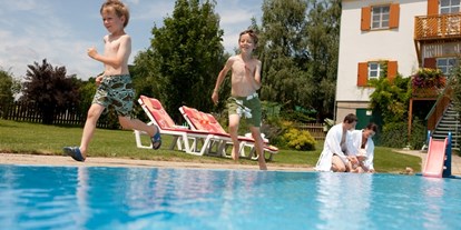 Familienhotel - Verpflegung: Halbpension - Steiermark - Schwimmbad vom Ballonhotelmit kleinem Innen und großem Außenbecken - Ballonhotel