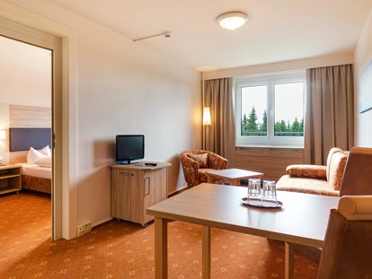Familienhotel - Umgebungsschwerpunkt: Stadt - Familienzimmer  - Hotel Am Bühl