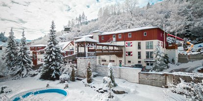 Familienhotel - Schwimmkurse im Hotel - Kärnten - Smileyhotel im Winter  - Smileys Kinderhotel 