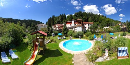 Familienhotel - Schwimmkurse im Hotel - Österreich - Smileys Freibad - Smileys Kinderhotel 