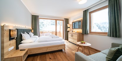 Familienhotel - Umgebungsschwerpunkt: Berg - Keutschach - Gutshof Familienzimmer - Hotel GUT Trattlerhof & Chalets****