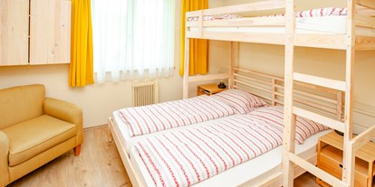 Familienhotel - Umgebungsschwerpunkt: Strand - Doppelzimmer Typ "Schneekönig" mit Etagenbett - Familienhotel Schneekönig