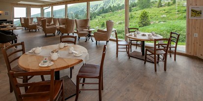 Familienhotel - Umgebungsschwerpunkt: Strand - Wintergarten mit Panoramafenster  - Familienhotel Schneekönig