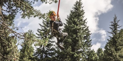 Familienhotel - Skilift - Klettern, Stand- Up Paddling, Drachenschaukel - die Möglichkeiten im Hirschen Camp sind endlos, der Spaß riesig - Seehotel Jägerwirt
