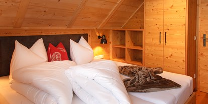 Familienhotel - Sauna - Kärnten - Schlafzimmer - Trattlers Hof-Chalets