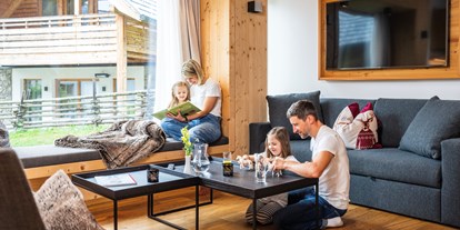 Familienhotel - Skilift - Trebesing - Familienurlaub in Trattlers Hof-Chalets - Trattlers Hof-Chalets