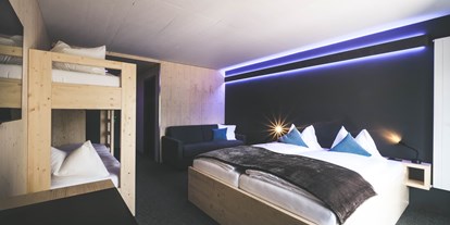 Familienhotel - Einzelzimmer mit Kinderbett - Grächen - Hotel Zimmer - Frutigresort Berner Oberland
