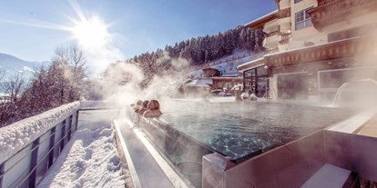 Familienhotel - Umgebungsschwerpunkt: Fluss - Tirol - 32° Infinity Outdoor Pool - Alpin Family Resort Seetal