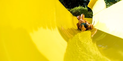 Familienhotel - Garten - Pinzgau - Zeller Schwimmbad Parter der Sommerkarte - Familien- und Sportresort Alpenblick