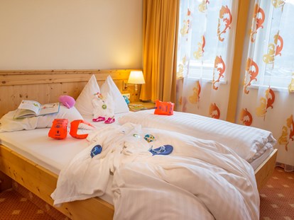 Familienhotel - Babysitterservice - Kitzbühel - verschiedene Zimmer - Familien- und Sportresort Alpenblick