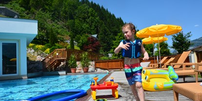 Familienhotel - Garten - Pinzgau - Spass am Pool - Familien- und Sportresort Alpenblick