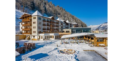 Familienhotel - Garten - Pinzgau - Sportresort Alpenblick Winter - Familien- und Sportresort Alpenblick