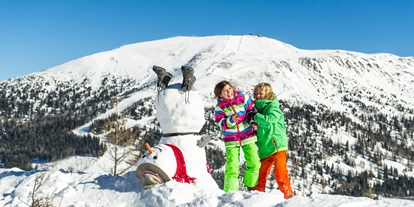 Familienhotel - Skikurs direkt beim Hotel - Kärnten - Winterspaß - Familienhotel Hinteregger