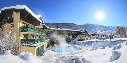 Familienhotel - Skikurs direkt beim Hotel - Gröbming - Außenansicht Winter im Familienhotel Sommerhof - Familienhotel Sommerhof