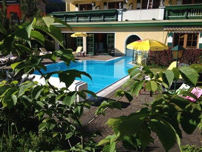 Familienhotel - Umgebungsschwerpunkt: Berg - Oberösterreich - beheiztes Freischwimmbad im Familienhotel Sommerhof - Familienhotel Sommerhof