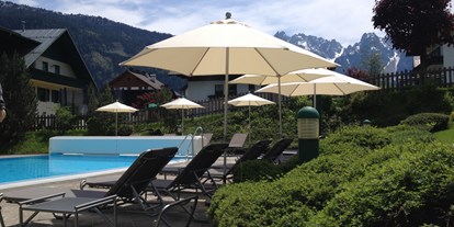 Familienhotel - Pools: Außenpool beheizt - Oberösterreich - Liegefläche im Familienhotel Sommerhof - Familienhotel Sommerhof
