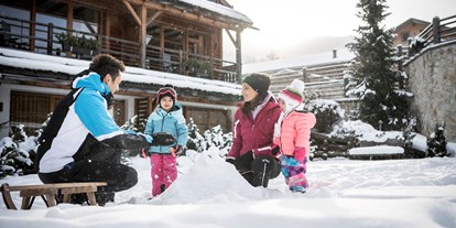 Familienhotel - Garten - Italien - Post Alpina - Family Mountain Chalets