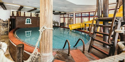 Familienhotel - Schwimmkurse im Hotel - Österreich - Kinderhallenbad "Käpt`n Hook" - Kinderhotel Waldhof