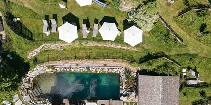 Familienhotel - Ausritte mit Pferden - Salzburg - Unser Naturschwimmteich - Kinderhotel Waldhof