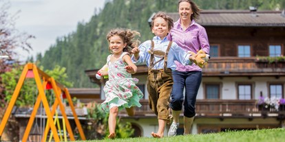 Familienhotel - Garten - Pinzgau - Familie am Mühlpointhof - Familien und Vitalhotel Mühlpointhof ***S