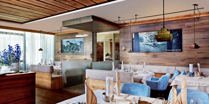 Familienhotel - Garten - Italien - Elegant gedeckte Tische im Restaurant - Familien - und Wellnesshotel Prokulus