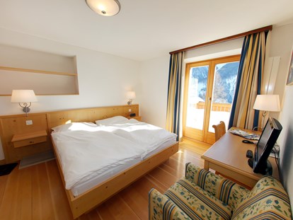 Familienhotel - Sauna - Graubünden - Familienzimmer im Aparthotel Muchetta, Davos Wiesen, Schweiz - Aparthotel Muchetta