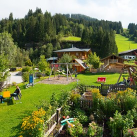 Kinderhotel: Spielplatz - Hotel Guggenberger