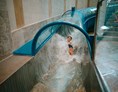 Kinderhotel: Kinderbad "Aquafix" mit 40 Meter langer Wasserrutsche und Kinderpool - Mountain Resort Feuerberg