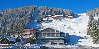 Familienhotel - Klassifizierung: 4 Sterne - Familotel Hotel**** Alpengasthof Hochegger Aussen im Winter
 - Hotel & Alpengasthof Hochegger