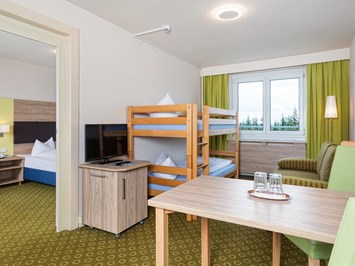 Hotel Am Bühl Zimmerkategorien Familienzimmer mit Doppelstockbett 