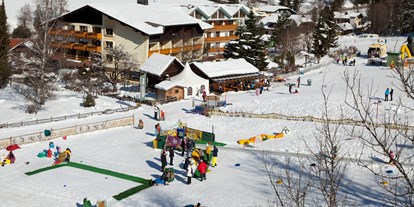 Familienhotel - Spielplatz - PLZ 9861 (Österreich) - Hotel direkt an der Piste  - Familien- & Sporthotel Kärntnerhof